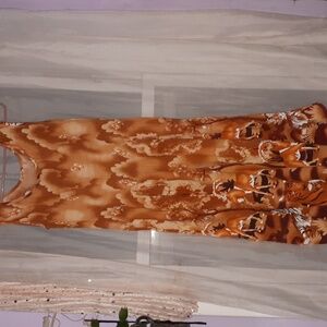 Dress, animal print, sleeveless, size small.